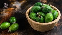 tropical-fruit-feijoa-in-a-wooden-plate-top-view.jpg