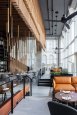 Timber screens divide up Tel Aviv restaurant L28 by Kimmel Eshkolot Architects.jpeg